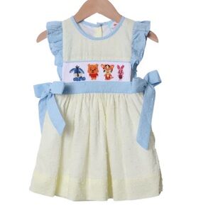 THE SMOCKED FLAMINGO
Honey Bear and Friends Yellow Swiss Dot Dress